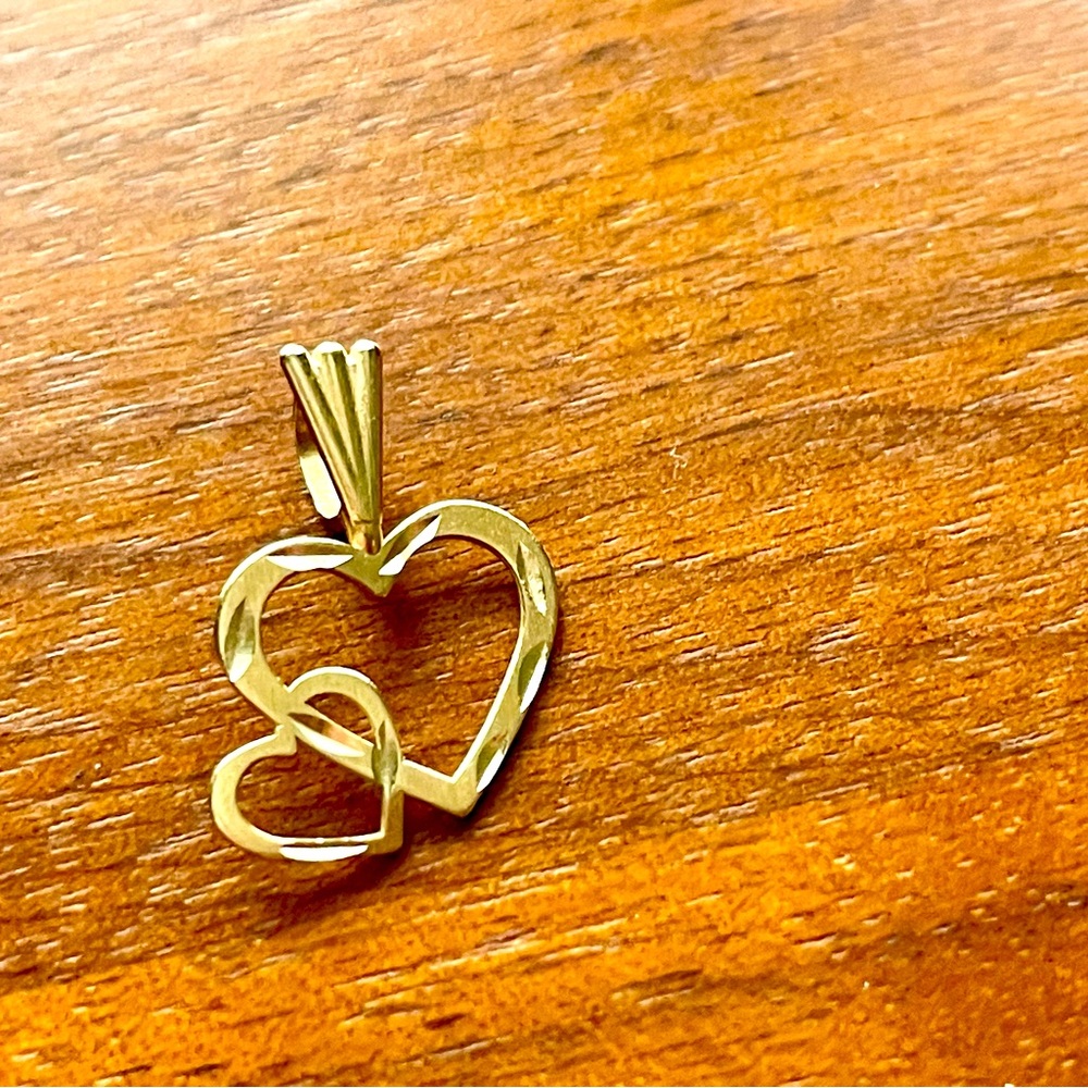 Gold Heart Shaped Necklace with Intertwined Design